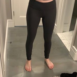 Lululemon dark gray mid rise leggings size 6